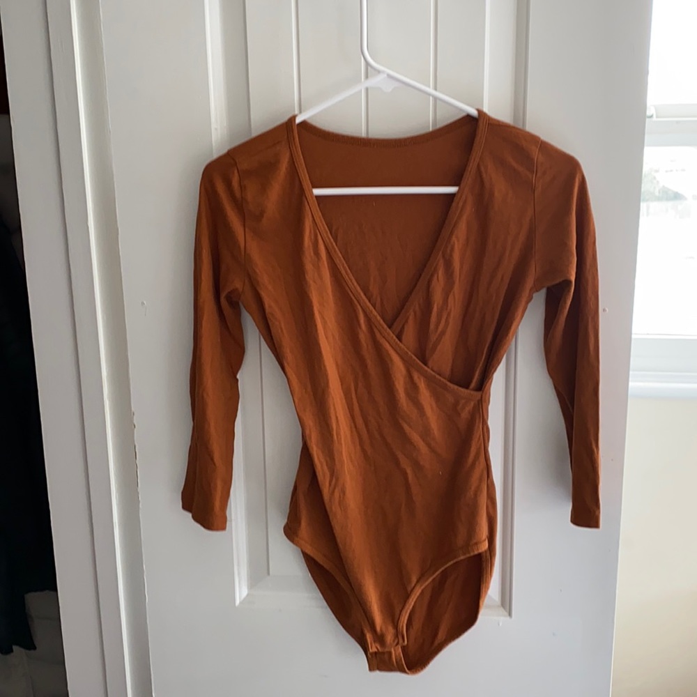 Wrap front body suit